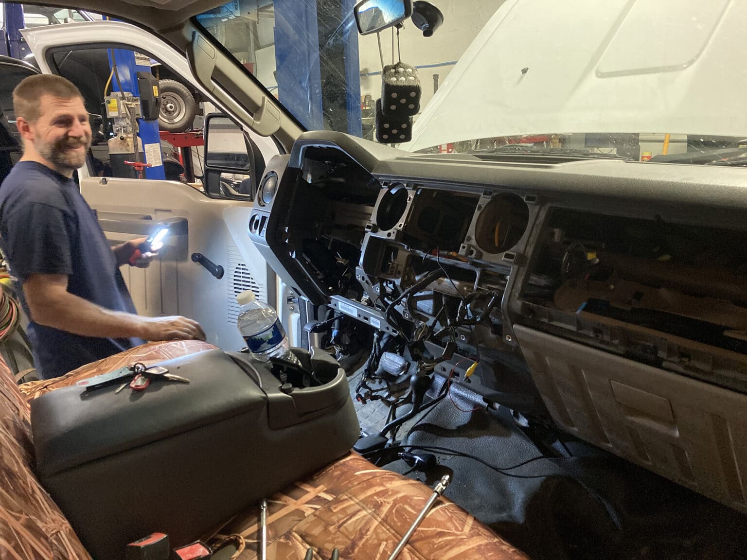Inside view of a truck dashboard being repaired at Rob's Truck & Auto Repair.