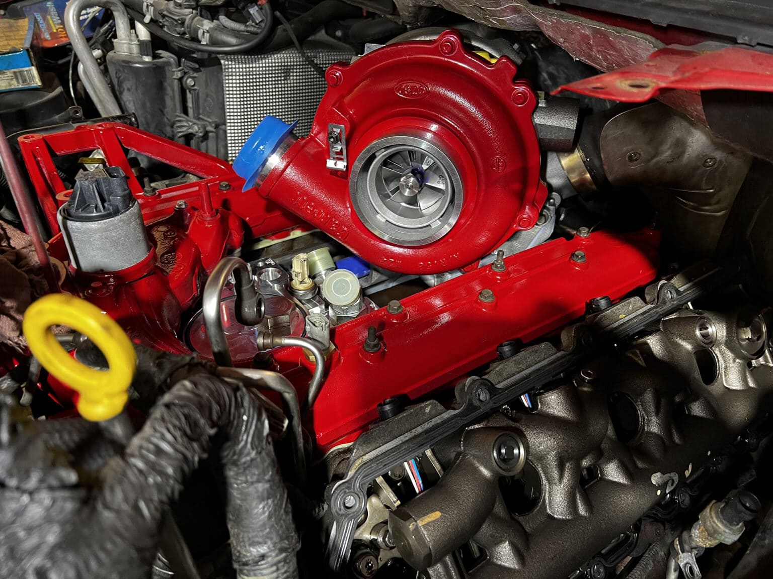 Turbocharger installed in a vehicle engine for increased power and efficiency.