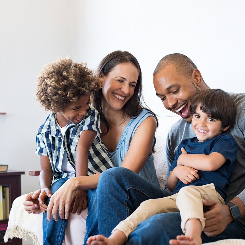 An image that shows Family Having Fun At Home