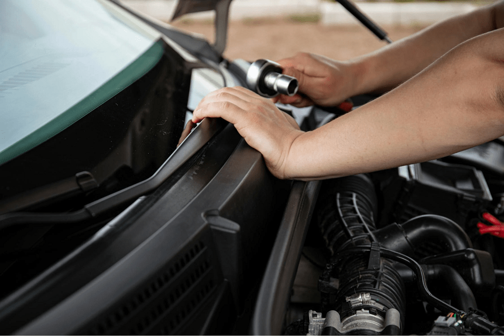 Engine diagnostics during a full-service auto repair at Sam's Auto Repair.