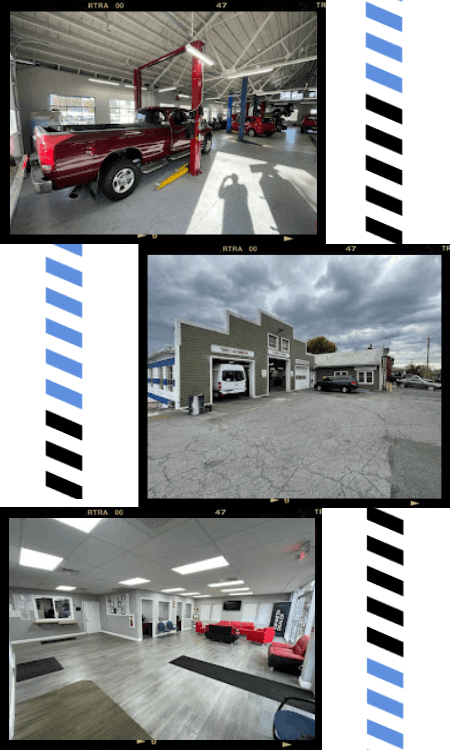 Auto repair garage with lifts and vehicles in service.