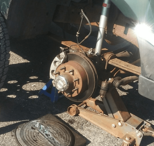 Wheel hub and brake assembly repair at Schimpfs Garage. Expert vehicle maintenance and brake service.