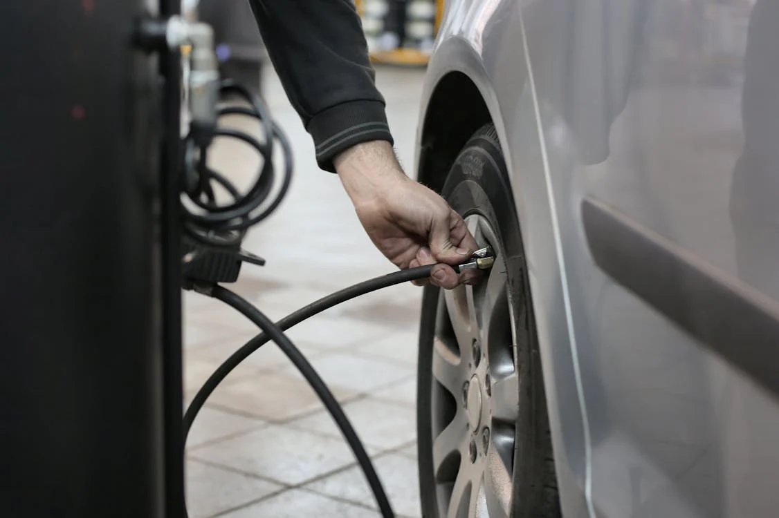 Professional tire repair being performed at Schimpfs Garage, quick fixes for safe driving.