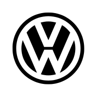 Volkswagen emblem on vehicle front grille.