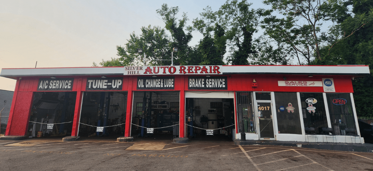 Auto repair shop with tune-up, oil change, brake service, and A/C repair.