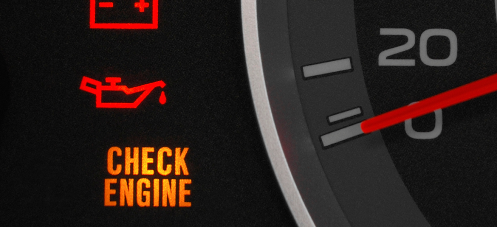 Vehicle dashboard with check engine light illuminated, emphasizing diagnostics and auto repair servi.