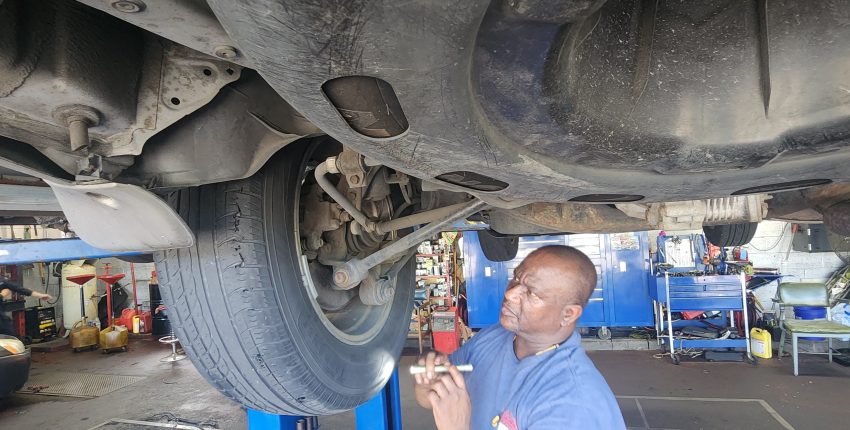 Mechanic-checking-car