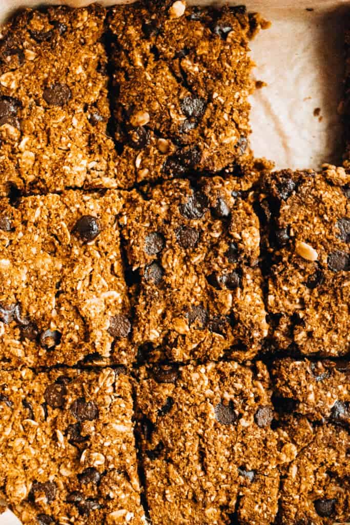 vegan pumpkin chocolate chip oatmeal bars on baking sheet