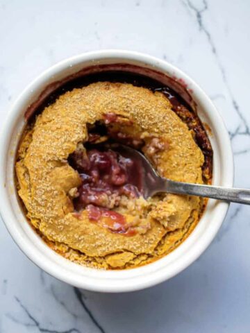Jelly donut baked oats in a ramekin.