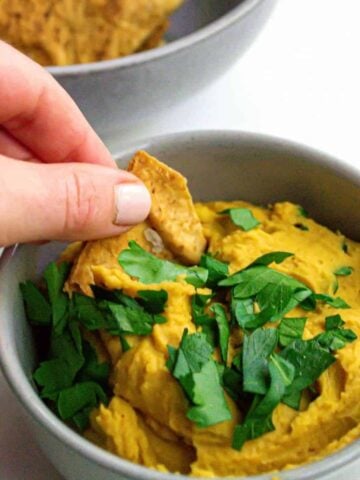 Pumpkin white bean dip in a bowl.