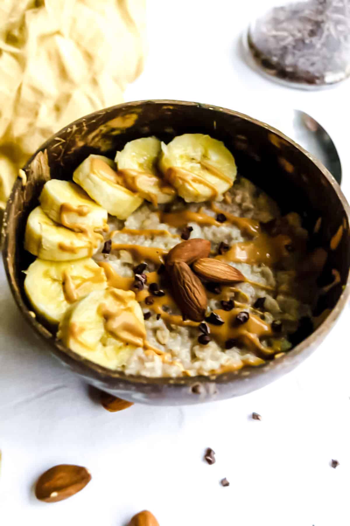 Overhead shot of PB2 oatmeal topped with banana.