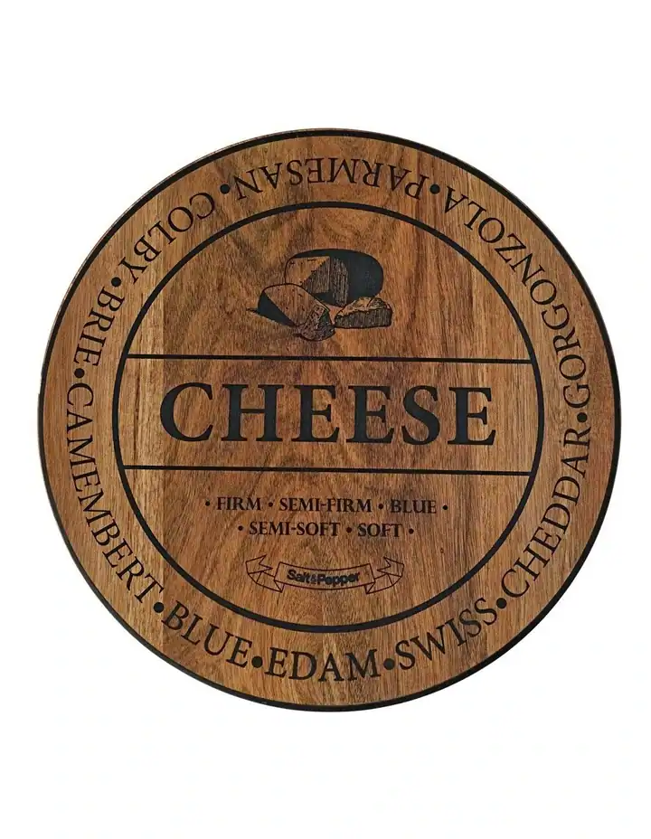 Overhead shot of engraved cheese board with the word 'CHEESE' and cheese names around the edge.
