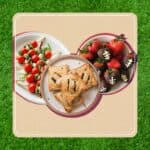 A thumbnail image for an article about AFL Grand Final party food, featuring photos of caprese skewers, hand pies, and chocolate covered strawberry footballs against a footy-inspired background.