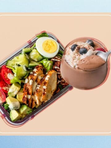 Cobb salad with grilled chicken, boiled egg, and creamy dressing with chocolate and protein pudding in a glass.