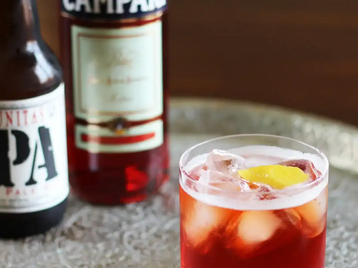 Close up of an IPA Campari spritz, a delicious mixed drink for NYE.