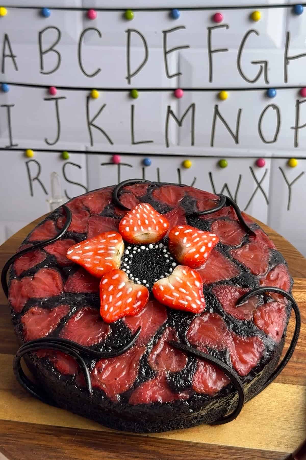 Strawberry upside down cake with a Demogorgon centre, inspired by Stranger Things.