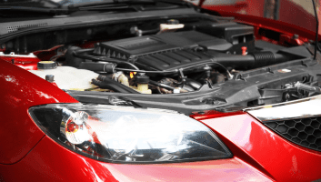 Close-up of a car engine during a tune-up at Teays Valley Auto.