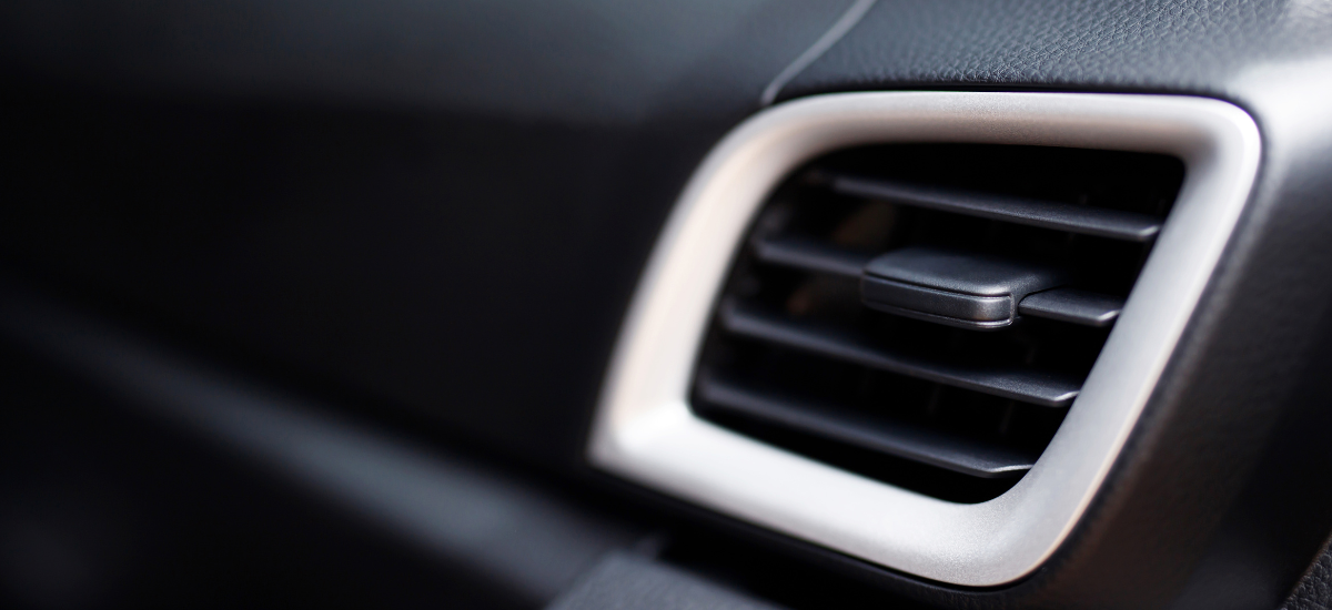 Auto AC vent for vehicle cooling and comfort.