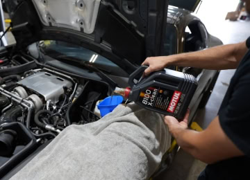 Engine oil change service for optimal vehicle performance.