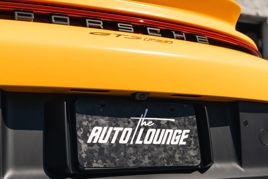 Porsche 911 Turbo S rear with Auto Lounge license plate.