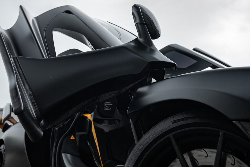 Luxury sports car dashboard and steering wheel.