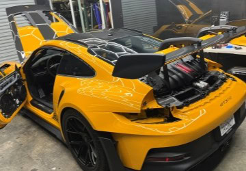 Sports car engine and aerodynamic design for luxury vehicle services.