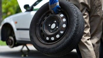 Professional tire replacement service at The Car People for safe driving.