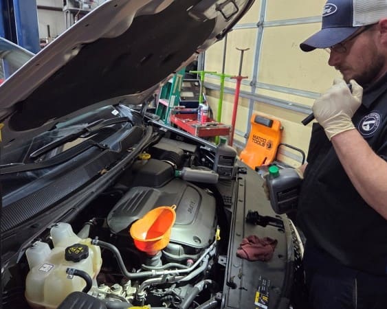Engine repair and inspection by professional technician.