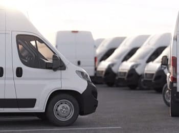 Commercial vans at The OTTO Shop vehicle dealership, ideal for business transportation needs.
