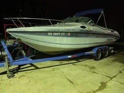 Boat with registration OH 2607 ZT on a trailer, ready for transport or storage.
