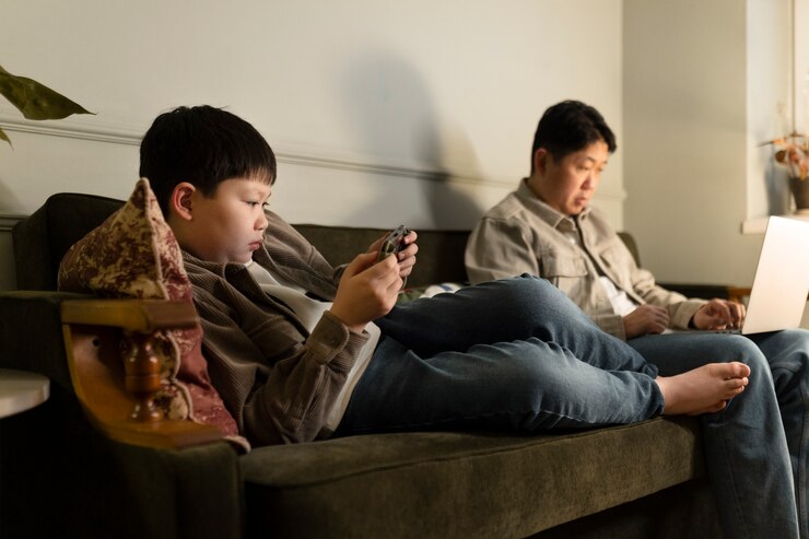 Parents Busy With Gadget