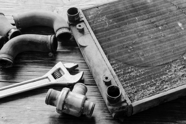 Radiator and automotive tools for efficient tire service and cooling system maintenance.