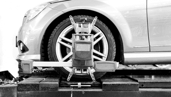 Tire service machine for wheel alignment and balancing at Tools in Motion.