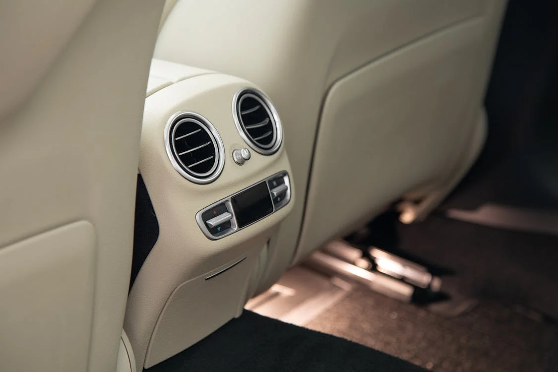 Car AC vent system for vehicle climate control.