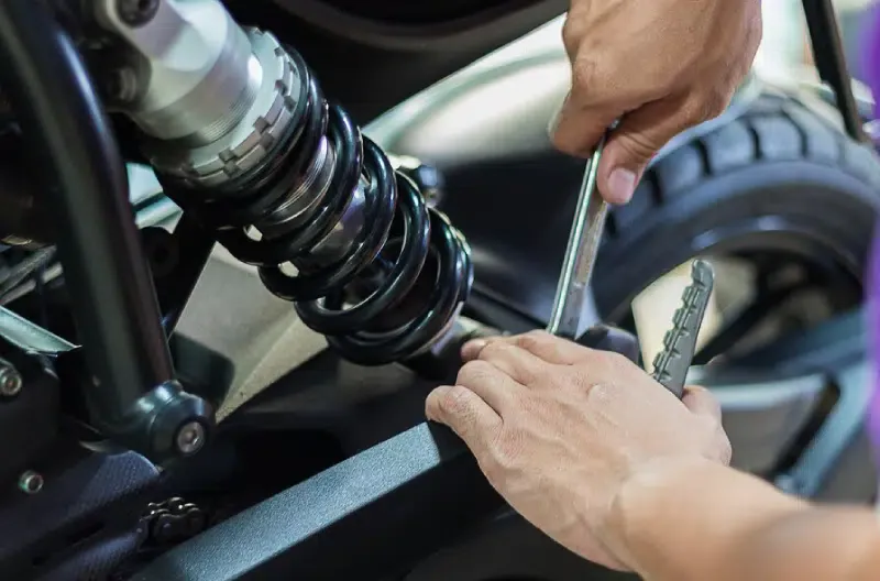 Suspension repair and upgrade services at Total Auto Services to enhance vehicle handling and comfor.
