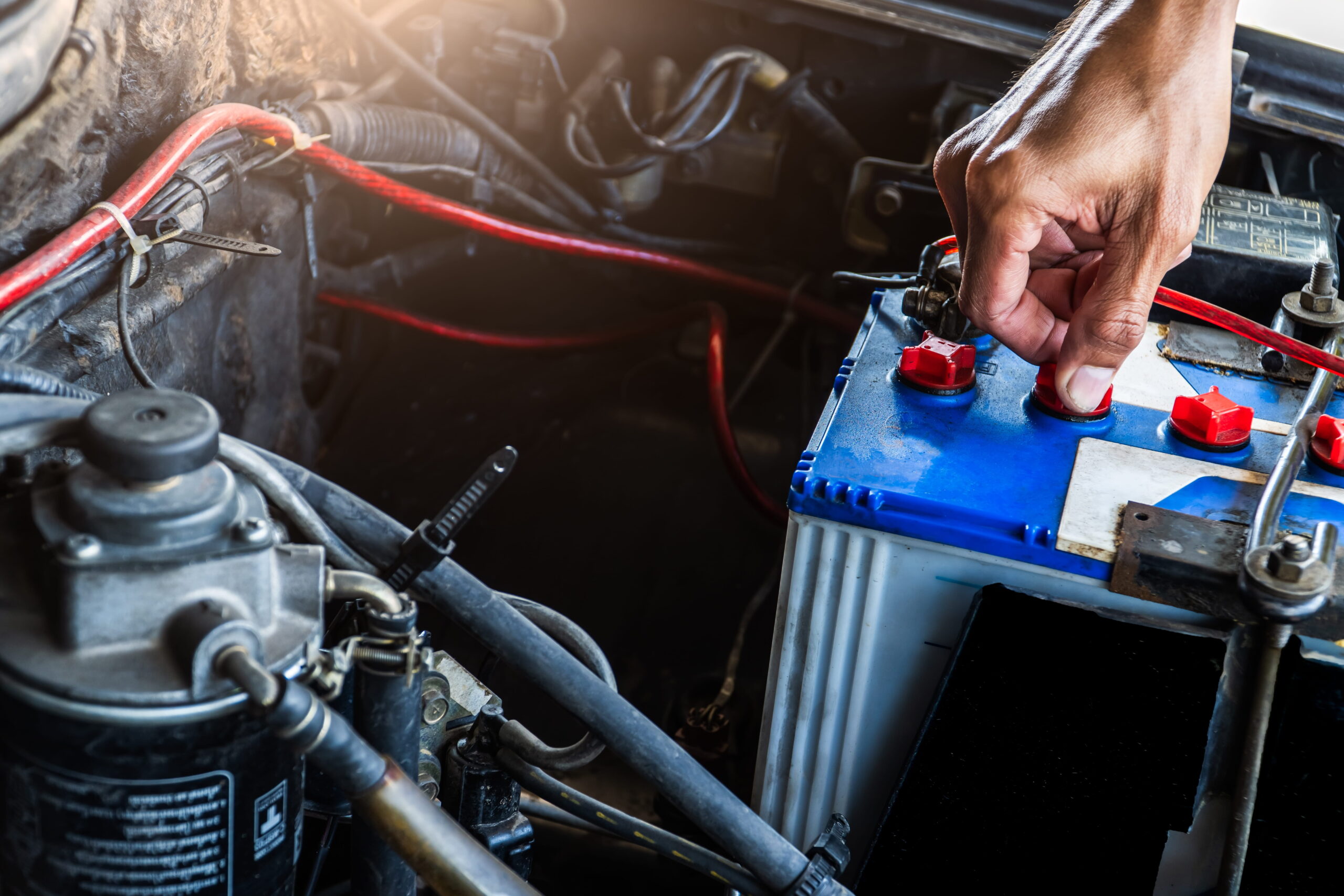 Battery testing and replacement for vehicle starting issues.