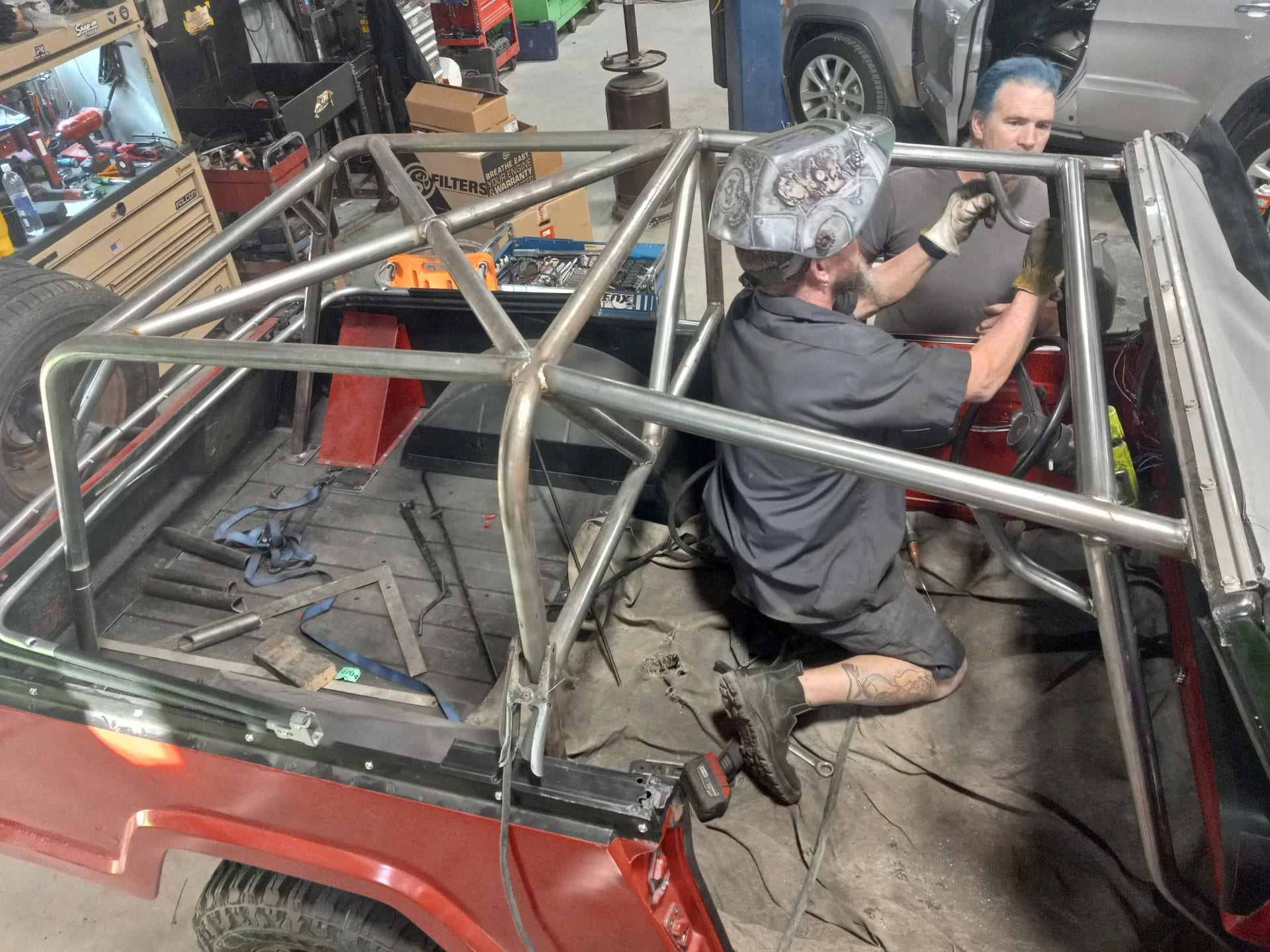 Custom off-road vehicle build at Trendsetters Customs workshop.