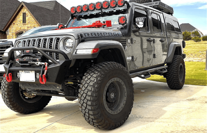 Custom Jeep Wrangler with extensive off-road modifications and custom accessories. Perfect for adven.