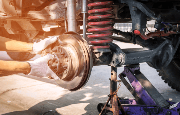 Wheel and suspension repair on a vehicle at Trendsetters Customs.