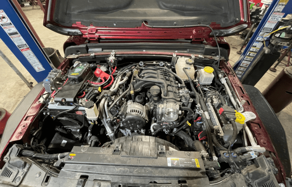 Engine bay with custom modifications and performance upgrades.