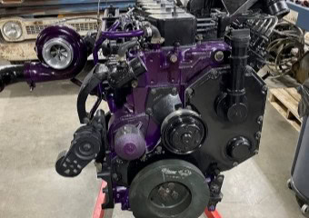 Custom purple engine by Trendsetters Customs for automotive projects.