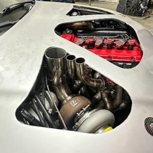 High-performance turbo engine with custom exhaust system at UAG Performance.