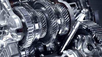 Transmission gears and components in a car transmission system.