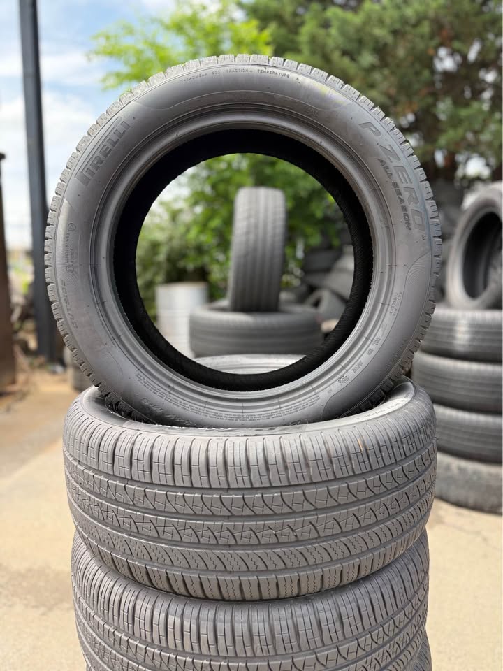 Stack of used tires at Universal Tire Tire Center for sale.