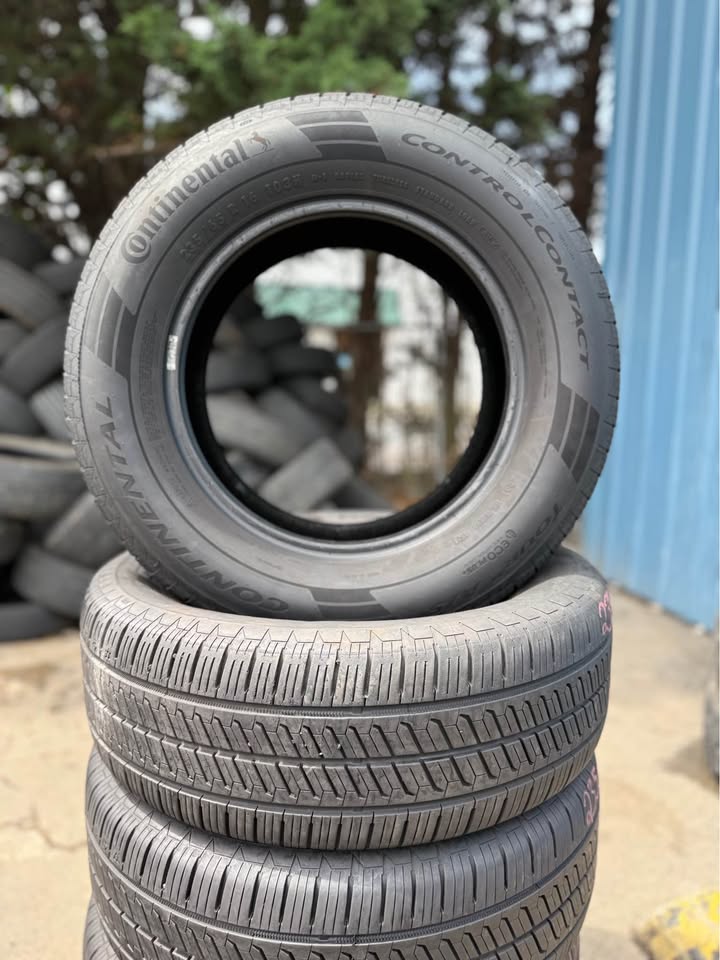 Stack of used tires for sale at Universal Tire Tire Center.