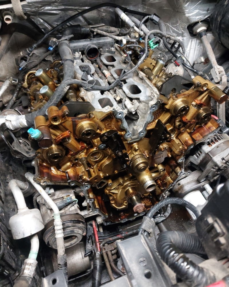 High-quality engine cylinder head and parts for vehicle repair at Vroom Auto.