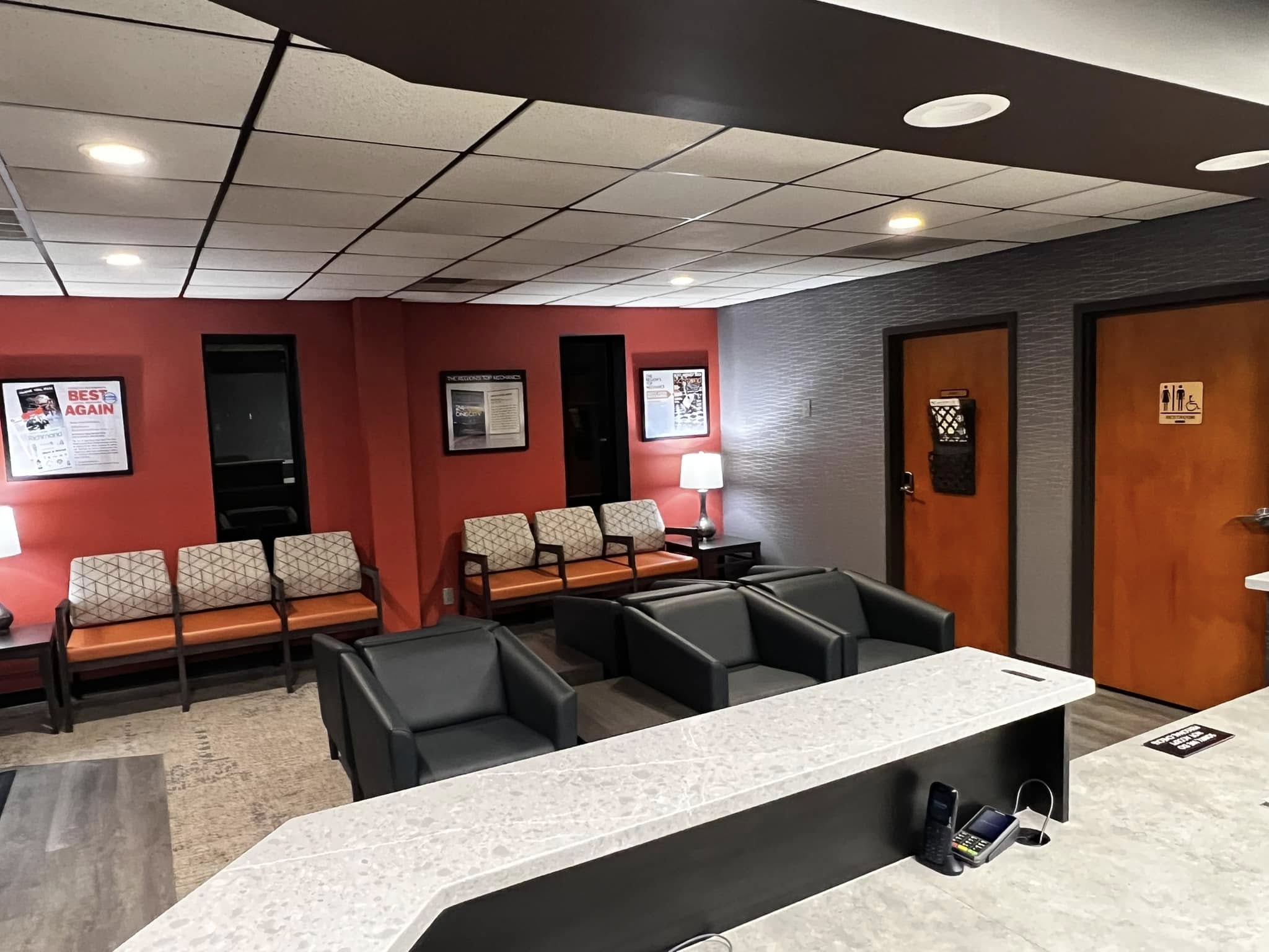 Modern customer lounge at Wallace Automotive with comfortable seating and welcoming atmosphere.
