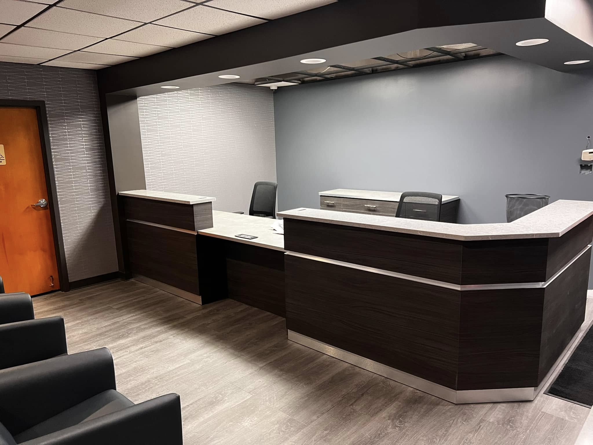 Modern automotive service reception desk at Wallace Automotive.