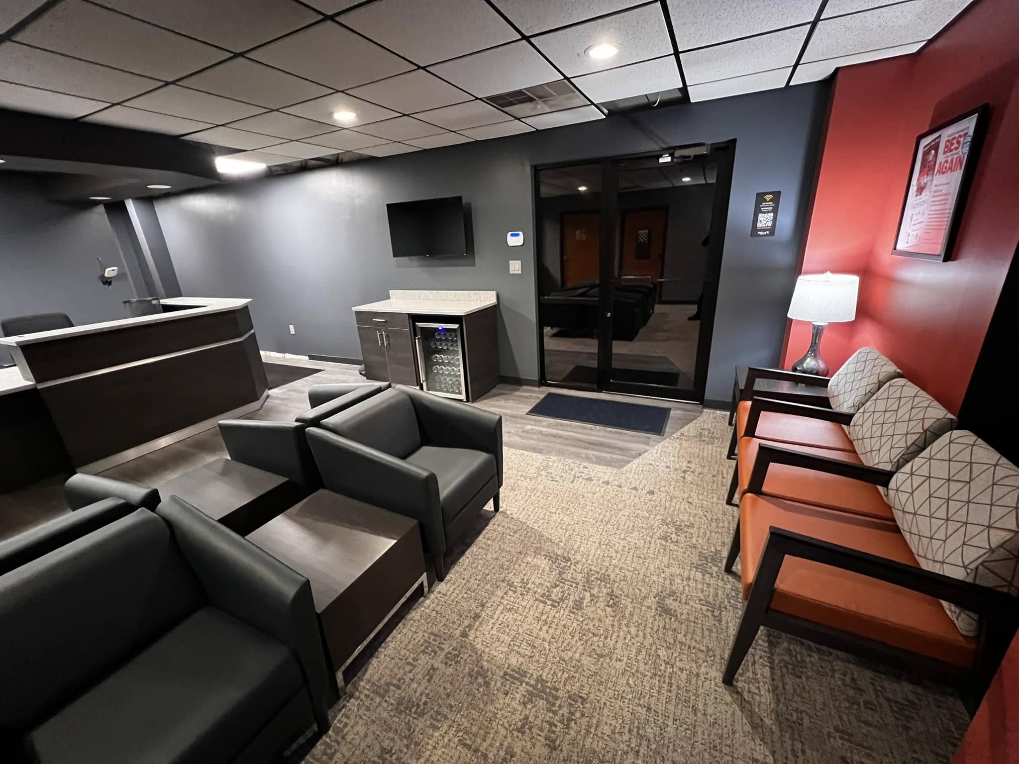 Modern customer lounge at Wallace Automotive with comfortable seating and welcoming atmosphere.