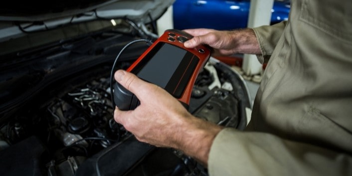 Advanced vehicle diagnostic testing under the hood.